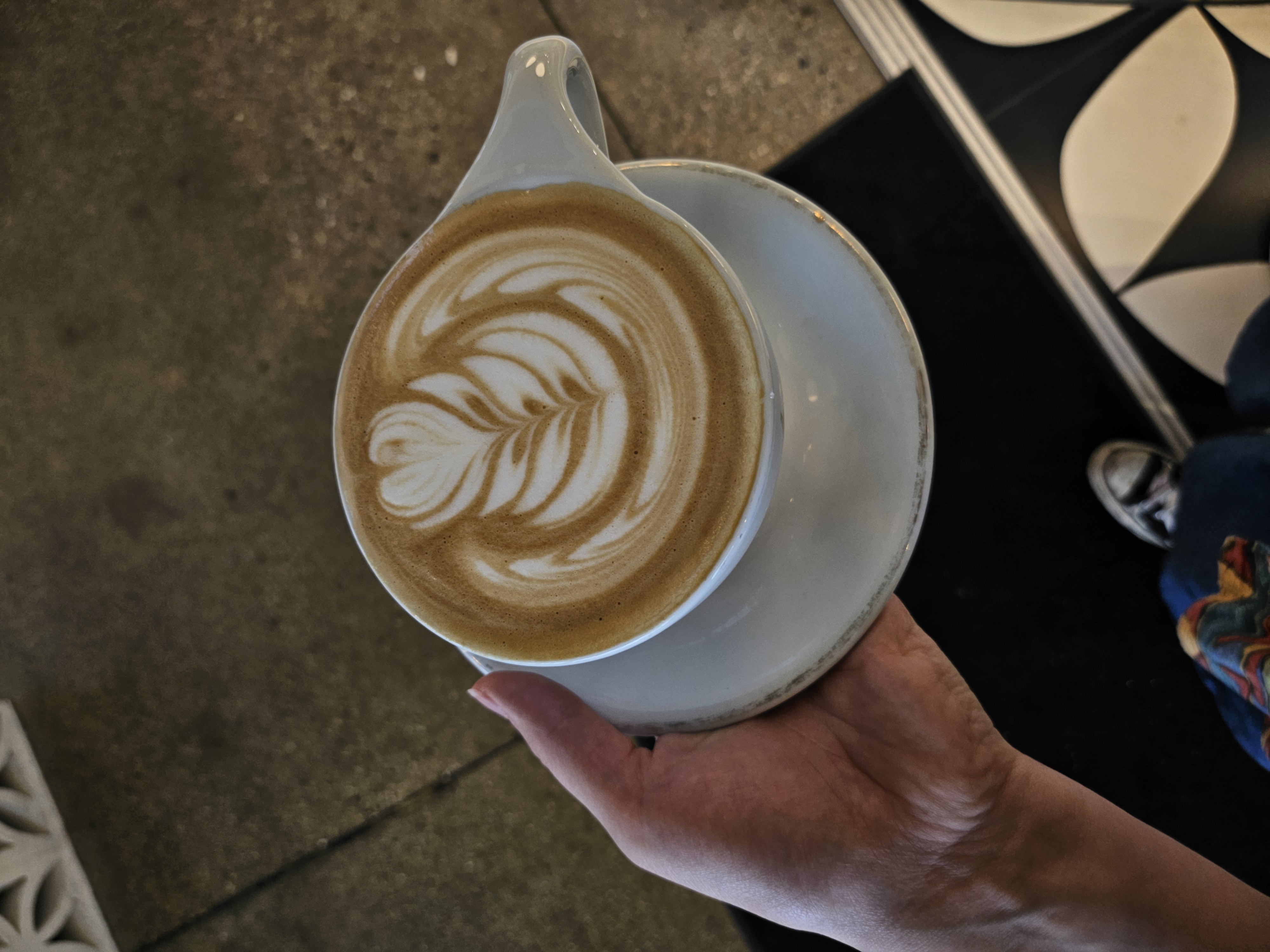 a latte with rosetta art